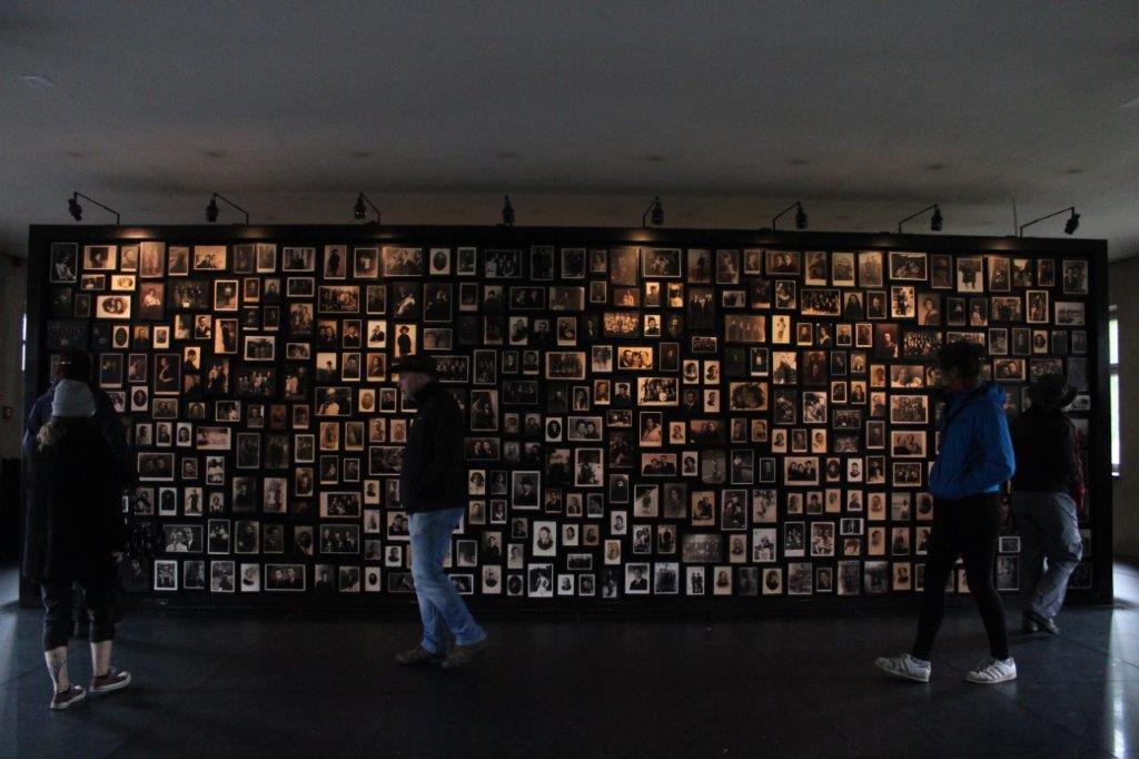 Photos found in suitcases of concentration camp victims, on display in the Sauna building in Birkenau, Poland