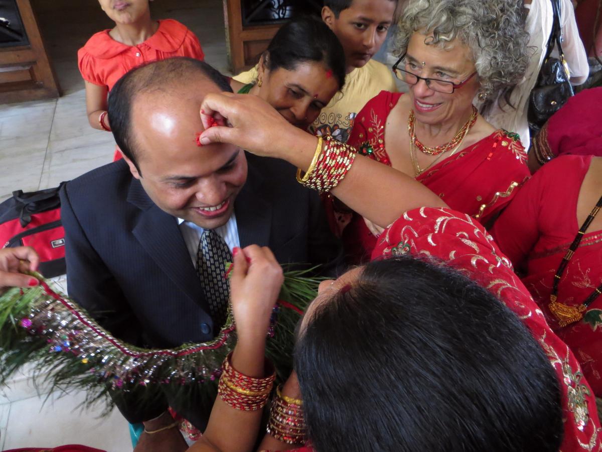 Dr. Raju and his sister Kamala on his wedding day in 2012 with Claire Weeks on the right 