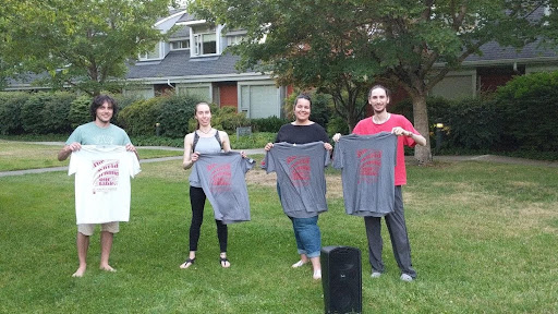 Winning team with their awards on St John's College's socially distanced outdoor trivia night