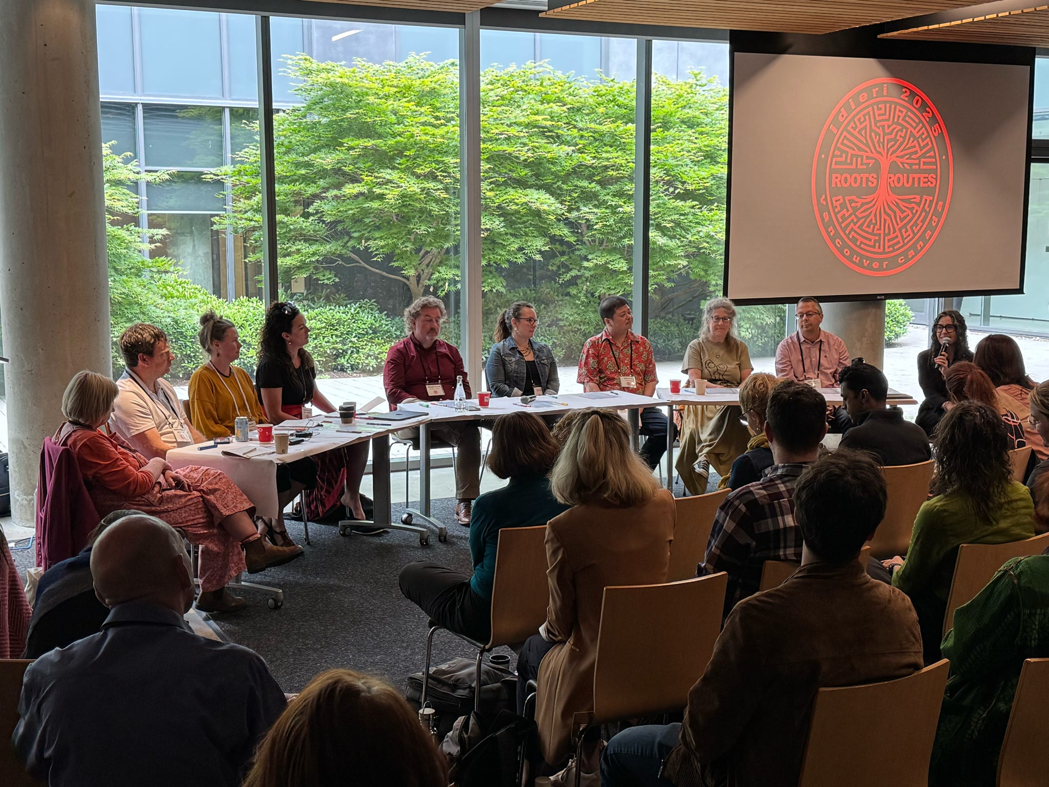A long-table plenary session at the UBC Vancouver Ponderosa Ballroom in June (photo: Sola John)