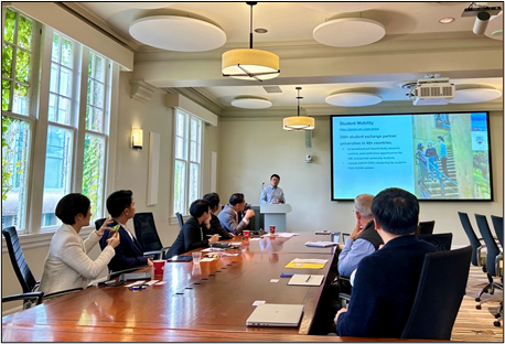 Haochen Li, with the UBC Office of Global Engagement, presents to the Thailand delegation on the UBC Vancouver campus (photo: Matt Stevenson)