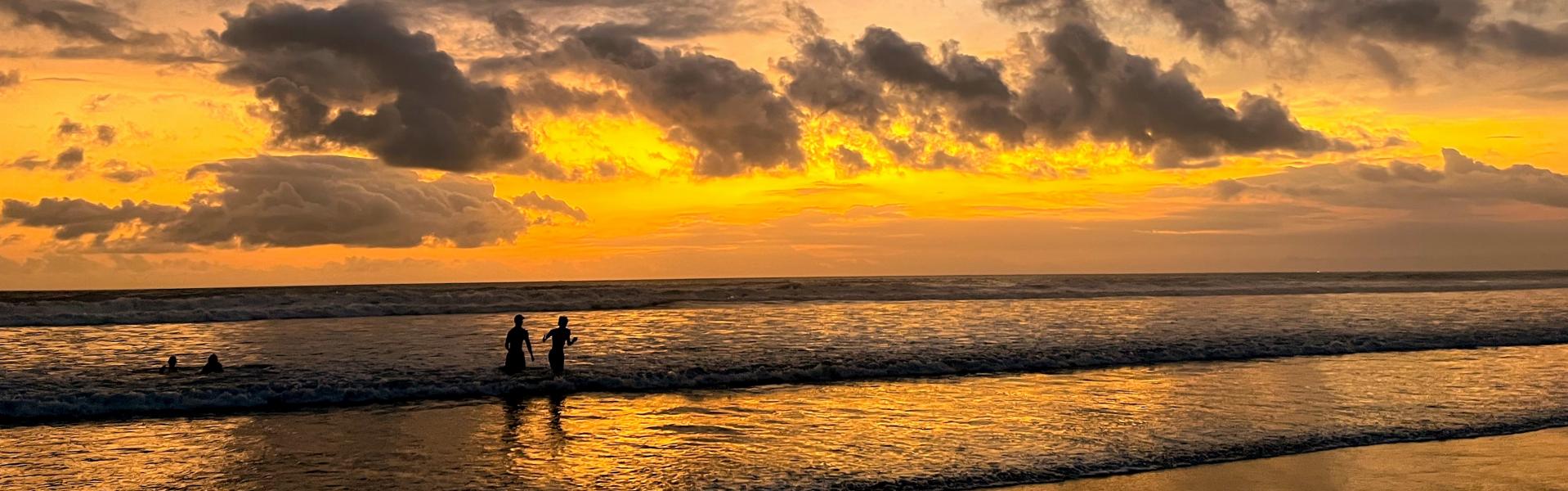 Exchange friends on a sunset swim at Canggu Beach in Bali (photo: Izzie Bjonness-Jacobsen)